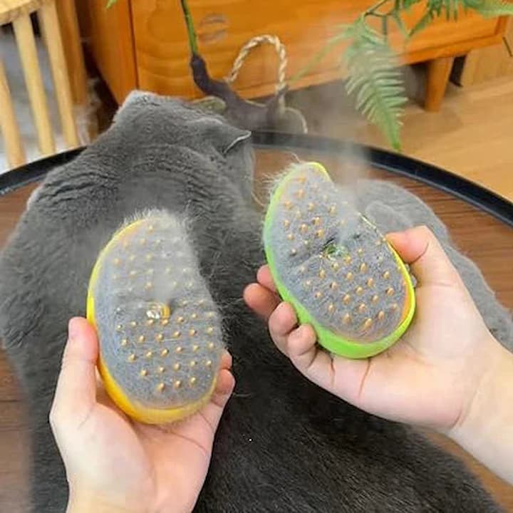 CleanBrush™ - 3-in-1 dampfende Katzenbürste
