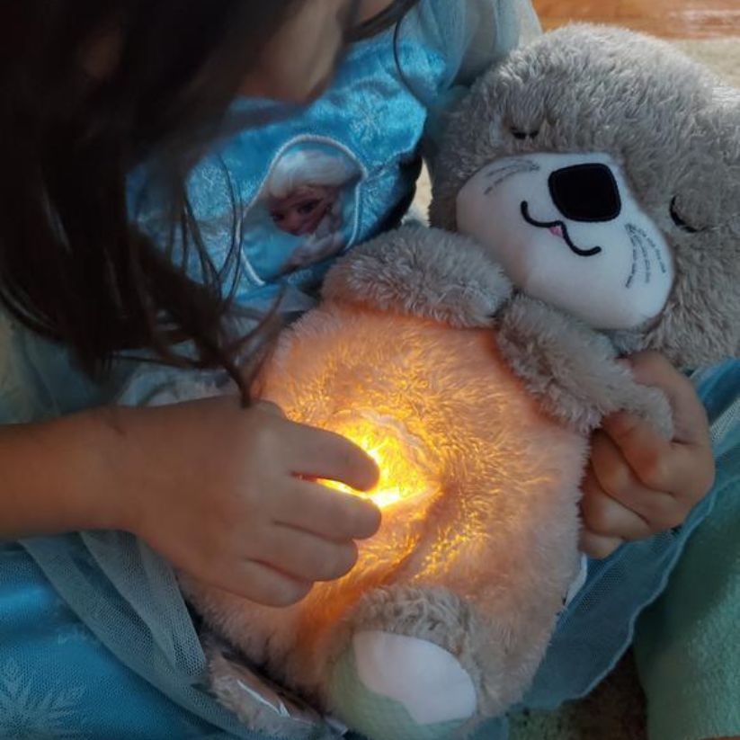 CuddleOtter - Schlafender Kuscheltierfreund